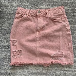 Pink mini denim skirt